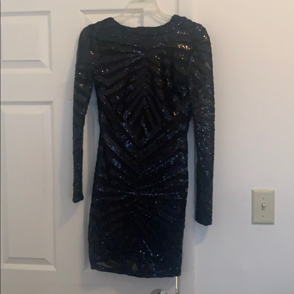 A black sequence dress